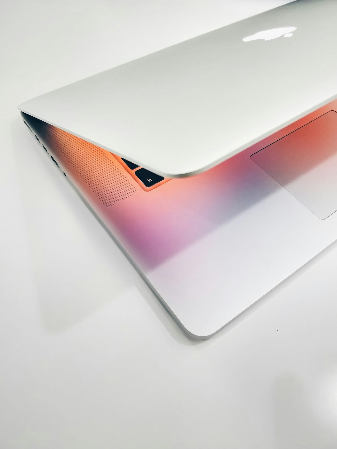 our-story apple-macbook-air-on-wooden-surface-az1dahlnyfc